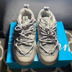 I’m selling brand new gray fashion nova sneakers that come with an undamaged box